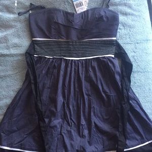 Navy blue dress with accent colors black and white